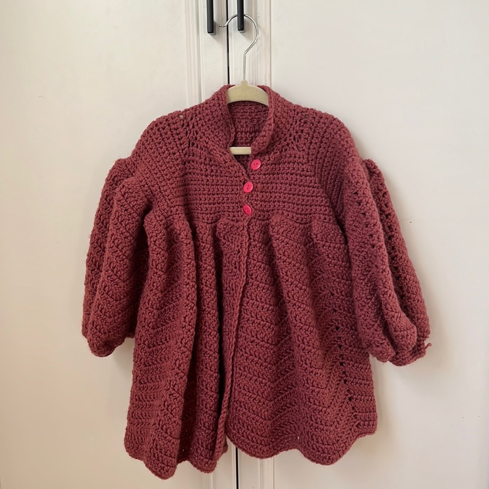 Girls handmade knit puff sleeve cardigan.